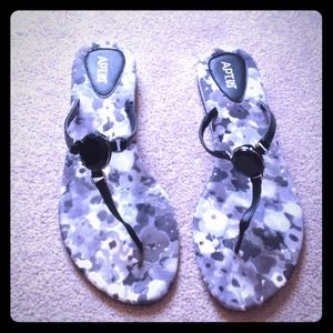 Fancy black and grey flip flops