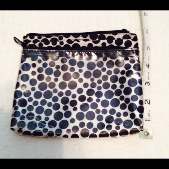 Black poka dot make up bag