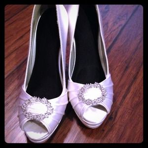 White satin pumps