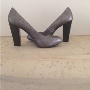 Calvin Klein Black and silver metallic pumps.