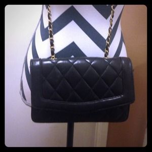 Black clutch with gold💟