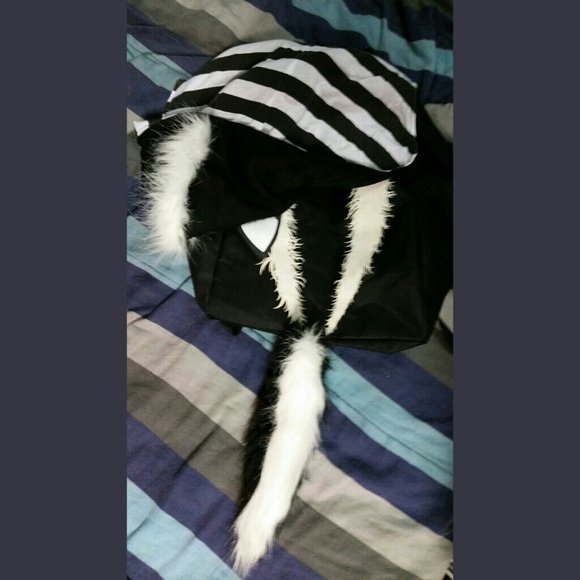 Skunk backpack with hood and tail