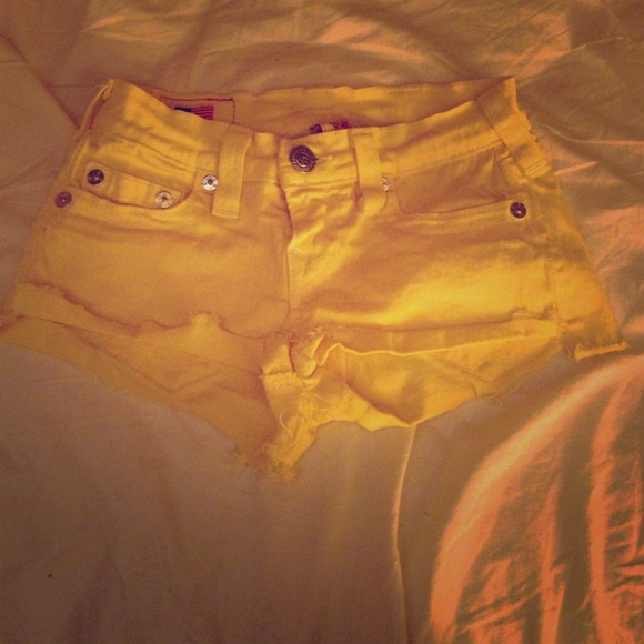 True religion light yellow cutt-off shorts