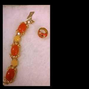 J crew bracelet with a  gold tone coach ring