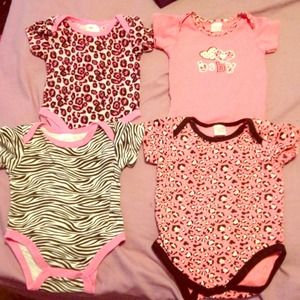 4 new baby onesies 0-3 months and 1 is 3-6 months