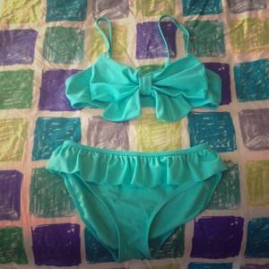 Light blue little girl's swim suit