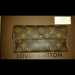 SOLD AUTHENTIC Louis Vuitton Trifold wallet.