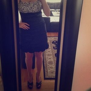 Just Above knee black dress with lots of detailing