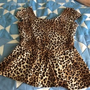 Cheetah print peplum top. Size sm/m