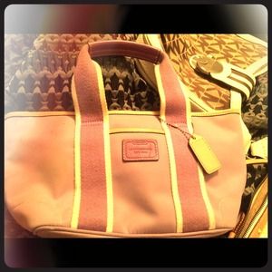 Lavender Coach mini bucket tote.
