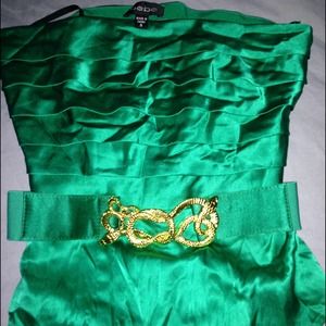 Emerald Green strapless top with gold snake belt.