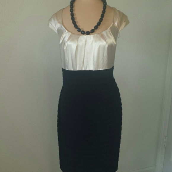 Party's black/beige dress reserved for @mflaherty