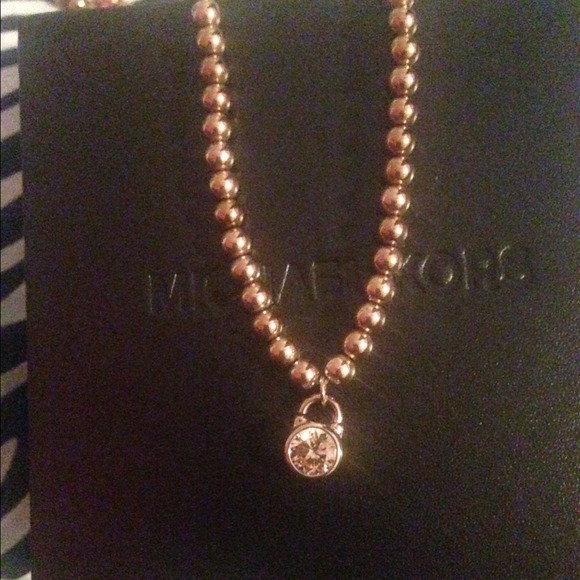 Micheal Kors rose gold necklace