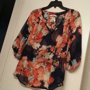 Lotus boutique sheer top