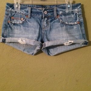 Distressed denim shorts