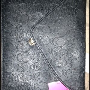 Brand new skull clutch