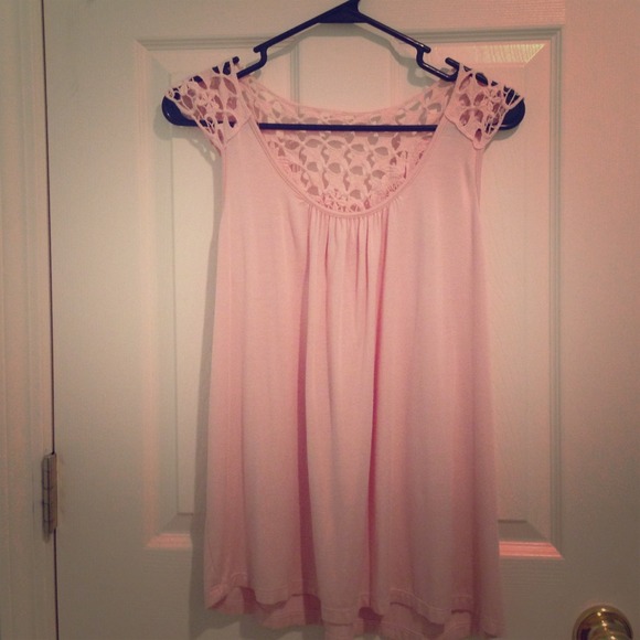 Light Rose, crocheted back shirt. Reaches past hip