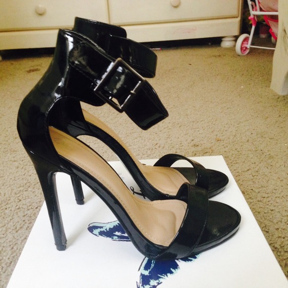 Black and red heels traded