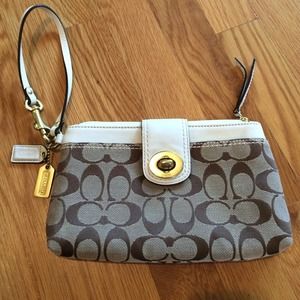Coach tan/cream wristlet