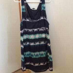 Hurley Tank top. Cotton, but mesh top on back.