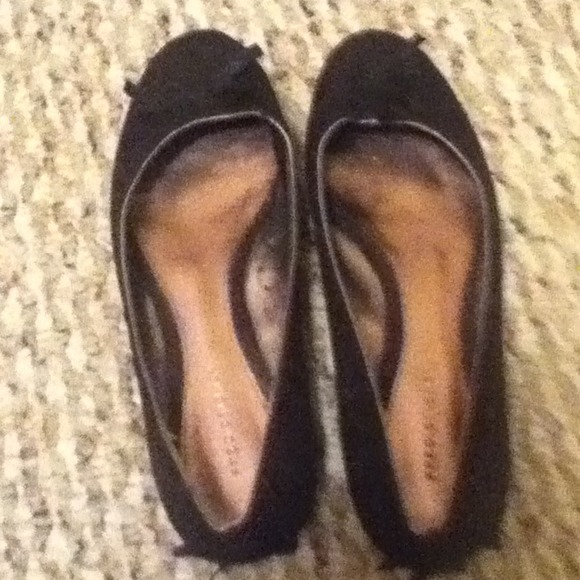 Black bow flats.