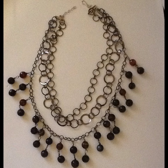 Dazzle tonight with triple chain necklace. - Picture 1 of 1