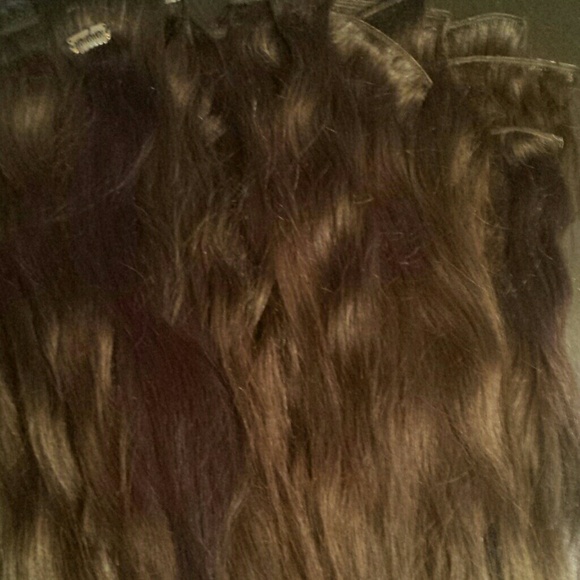 Dark brown clip in Remy hair extensions
