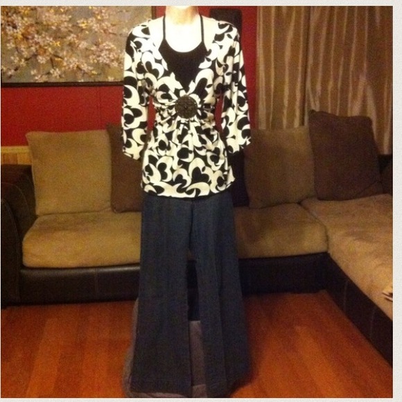 Dressy top with medallion center.