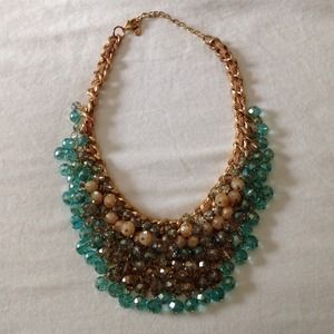 ALDO Statement Necklace and Coach Umbrella