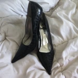 Black snake skin pointy heels