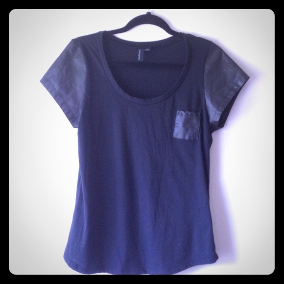 Black tee with faux leather sleeves and pocket 👓