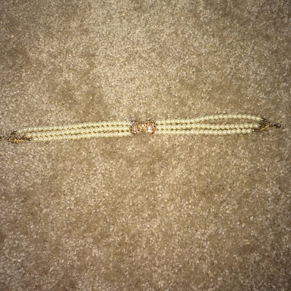 Pearl and gold bow choker