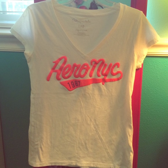 White V-neck with pink writing  from Aeropostale