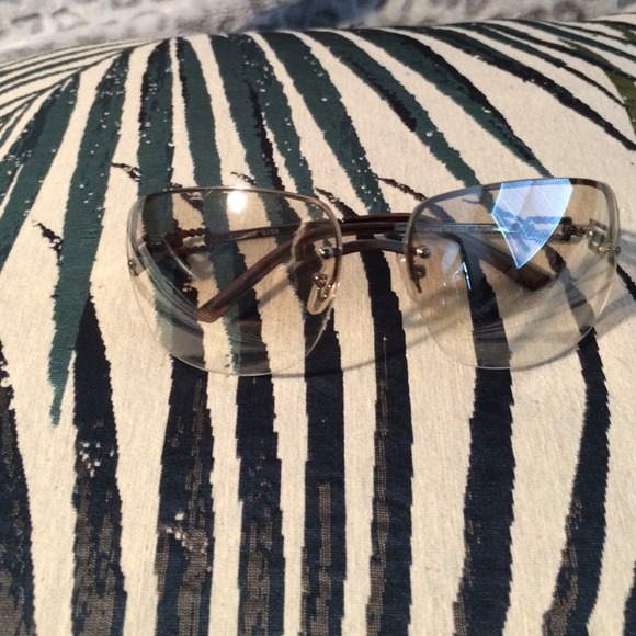 Kenneth Cole Reaction sunglasses.   HOLD