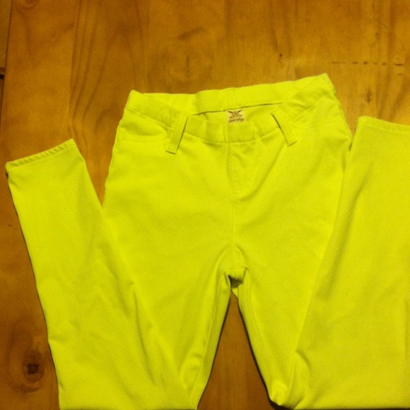 Yellow skinny leg jeggings.
