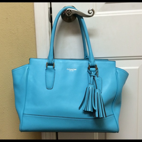 Light blue COACH New York shoulder bag.
