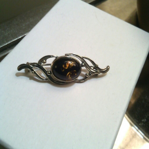 Brown onyx pin...