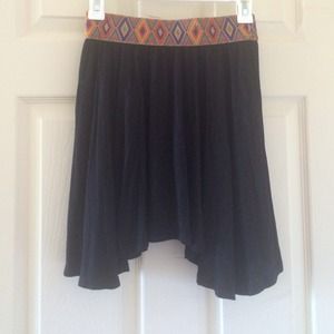uneven black skirt with Aztec design band