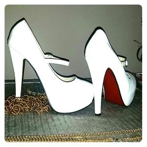 Red bottoms white heels.
