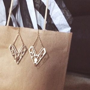 Gold earrings with an Aztec pattern!