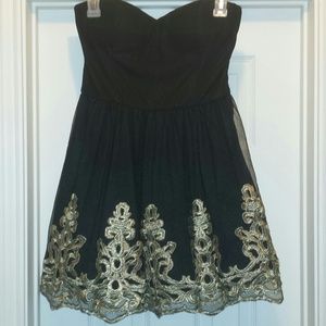 Black dress with silver/gold trim
