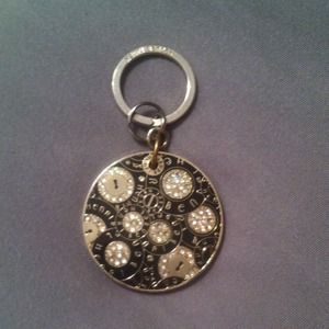 Black Henri bendel keychain with silver detail