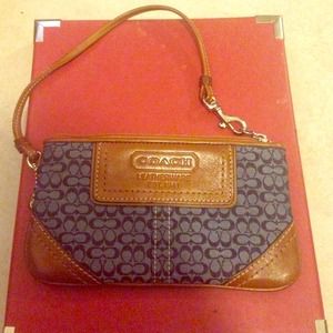 ---hold----not for sale!!! Coach wristlet blue