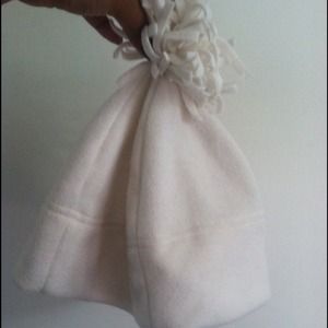 White beanie with frills on top