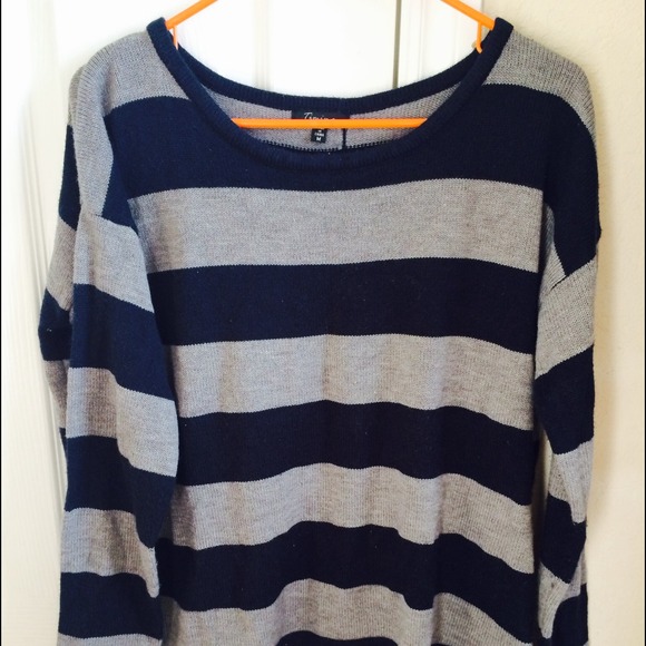 Blue and grey striped sweater.
