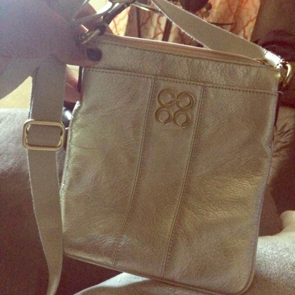 Gold coach messenger bag