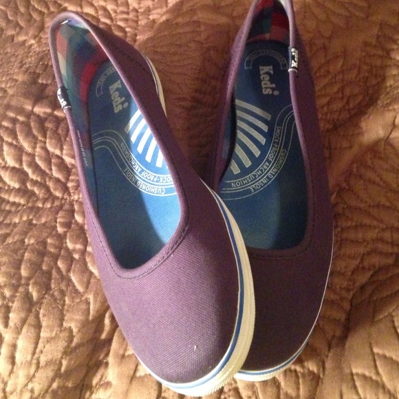 Keds Navy slip ons size 8.  Worn about 10 times.