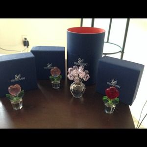 Swarovski crystal flower figurines.