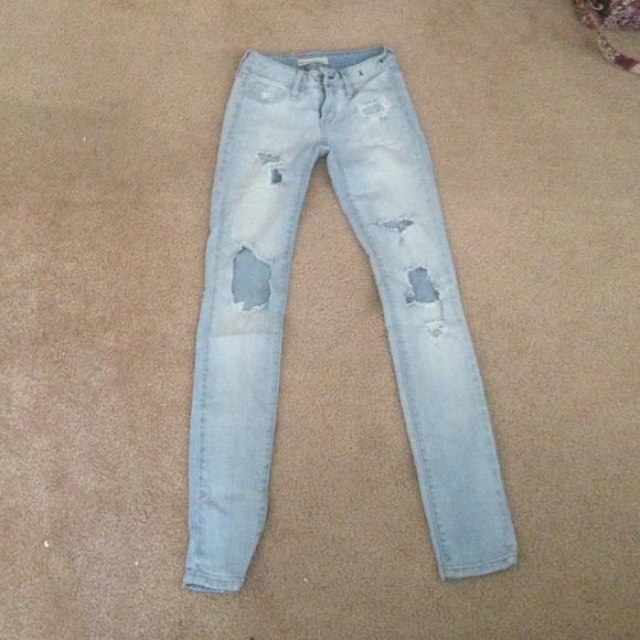 Light washed PAC sun ripped jeans