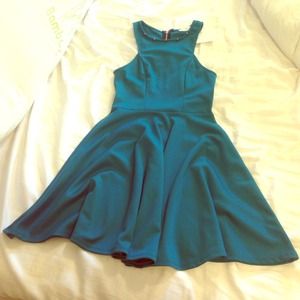 A teal flowy dress.